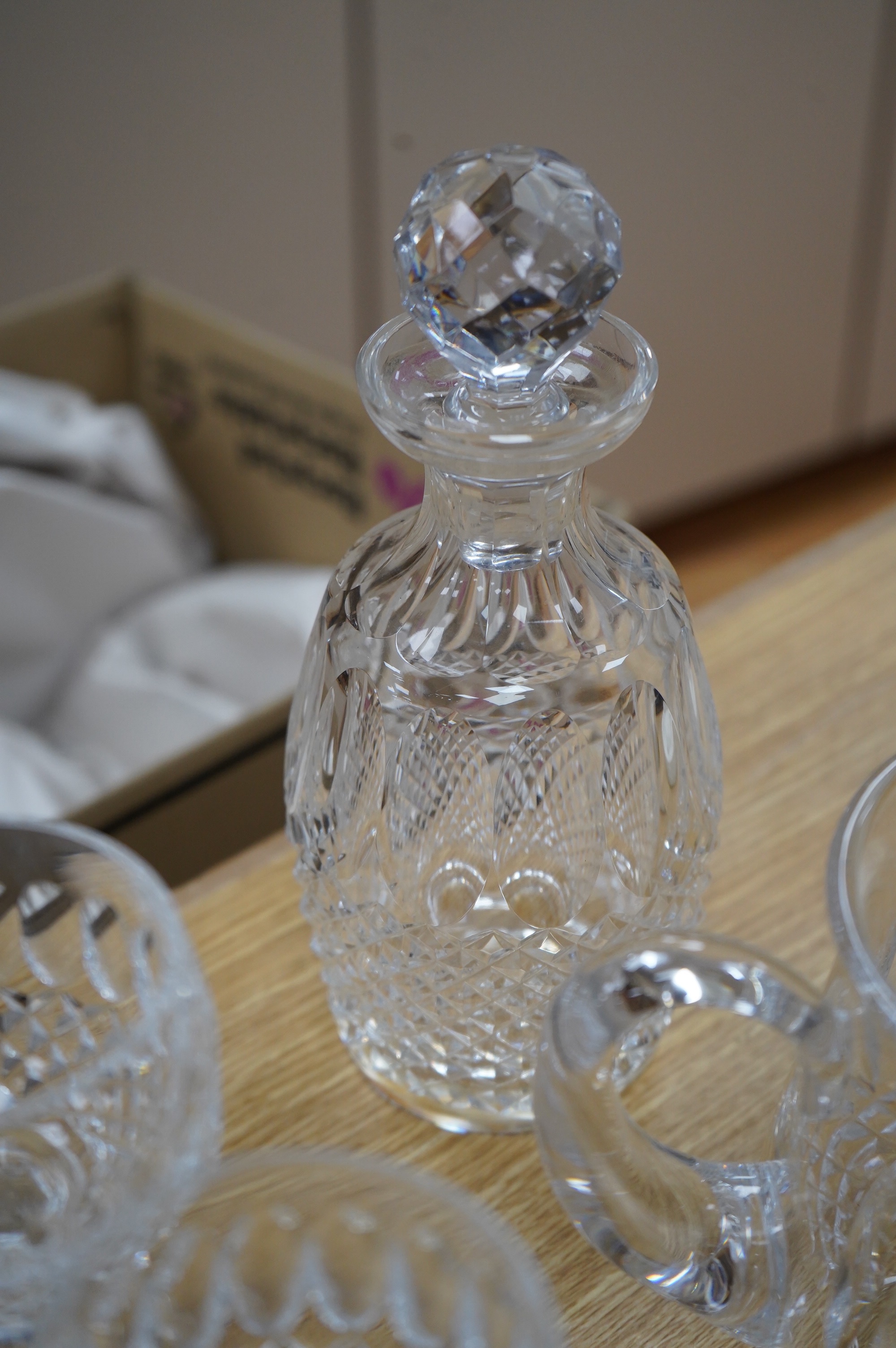 A Waterford Colleen pattern part suite of table glass including decanter, jug and glasses, largest 26cm high. Condition - mostly good